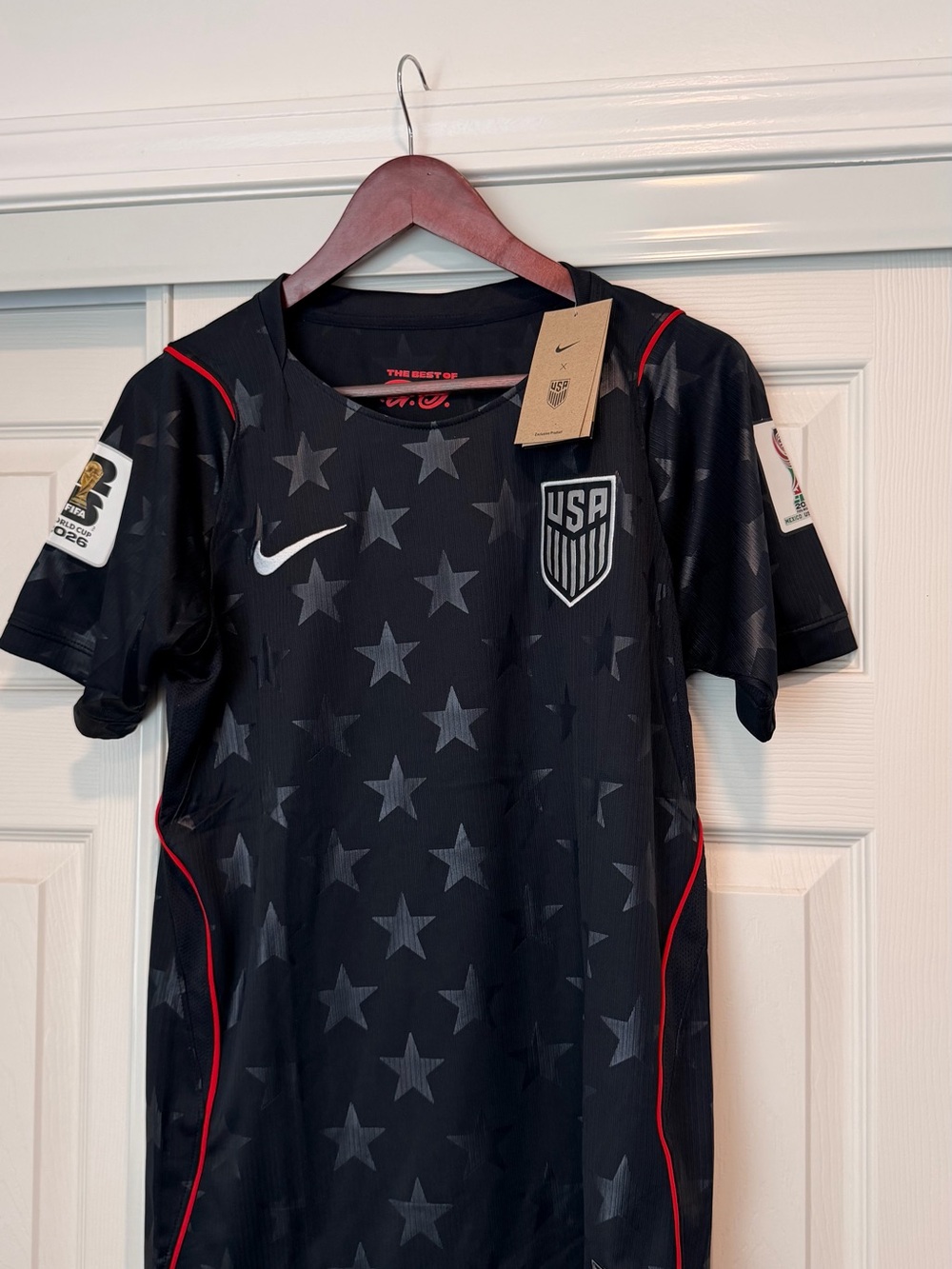 Nike Black Soccer Jersey with Red Piping and FIFA 2026 Patch